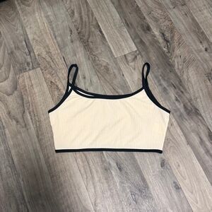 Beige rib knit cropped bralette tank with black contrast piping